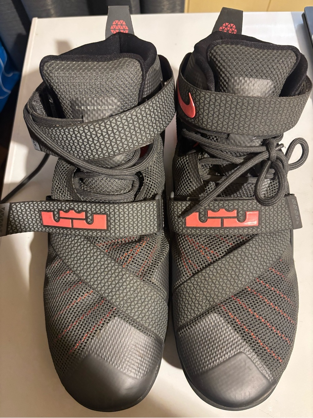 Nike Menโs Gray and Red High-Top Athletic Basketball Shoes